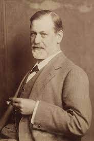 En totes les fotos es veu Freud fumant un puro