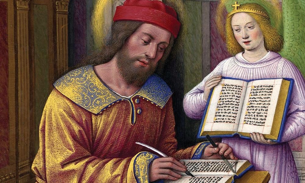 Sant Mateu escrivint el seu evangeli